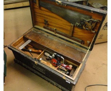 A Victorian painted tool box, complete with fitted trays, hand tools including hand drills, planes, rulers, saw, etc.