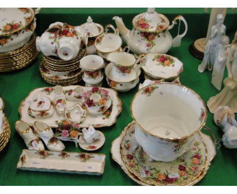 Royal Albert "Old Country Roses" teaset, including teapot, matching ornaments and jardiniere.