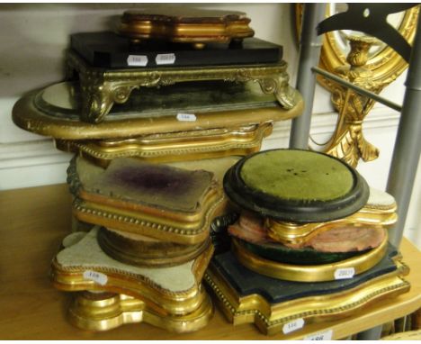 A Collection of continental clock stands & a dome plinth