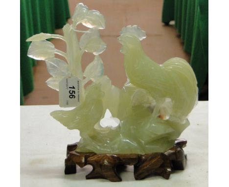 A carved jade group of cockerel and hen.