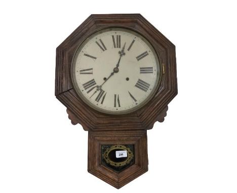 A wooden cased Wall Clock, the circular enamel dial with Roman numerals, and brass pendulum. (1) 