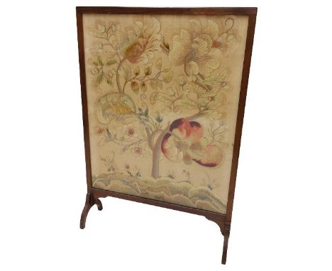An attractive needlework cheval Firescreen, worked with floral foliage with a glazed front, 100cms x 70cms (29'' x 27 1/2'') 
