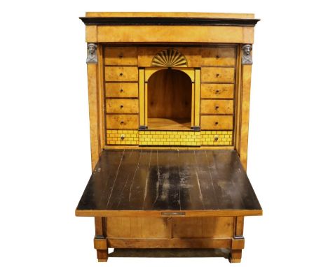 A fine quality Regency period ebonised and mahogany Bureau Abbatant, the moulded top over a drop down door opening to reveal 