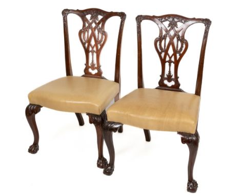 A very fine matched set of 10 (6 + 4) Chippendale style mahogany Dining Chairs, each with a pierced and carved interlaced spl