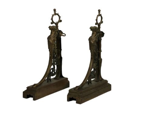 A Fireguard with a pair of 19th Century brass Andirons, decorated with bearded figures, pierced and scroll design. (1) 