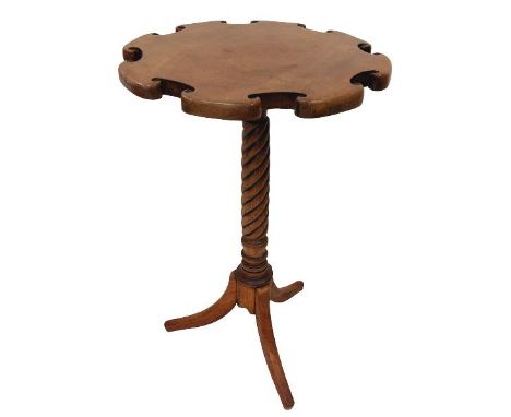 A very unusual 19th Century mahogany Occasional Table, the shaped circular top with cut out C scrolls on spiral reeded stem a