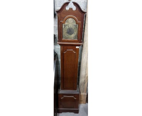 A mahogany and walnut Grandmother Clock, in the George III style, the divided and moulded pediment above an arch brass dial w