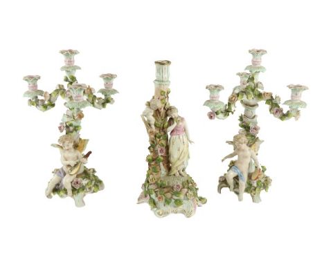 An attractive pair of Sitzendorf porcelainÿCandelabra, each with three flower encrusted arms and a centre light, each with a 