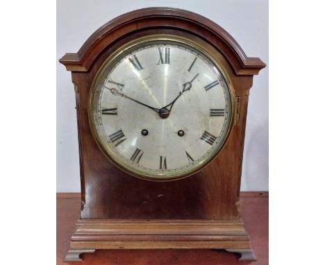 A 19th Century mahogany cased domed top Bracket Clock, the moulded top over circular silver dial with Roman numerals on a ste