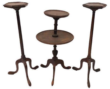 Two similar tripod Candlestands, each with hexagonal top and bead edge, 30'' (76cms), together with a tripod two tier Dumbwai