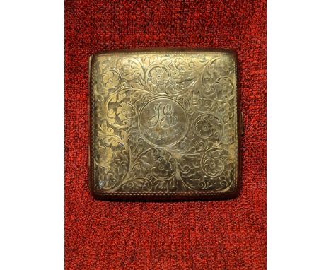 Early 20th century pocket cigarette case with chased scroll and floral decoration with silver gilt interior, Birmingham 1911 
