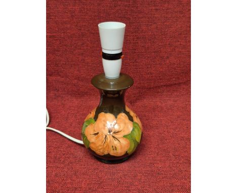Moorcroft Hibiscus pattern table lamp standing 26cm tall.