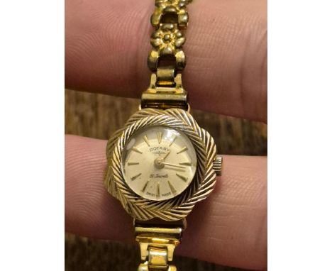 9ct gold ladies Rotary 21 jewel cocktail watch with gold plated daisy chain bracelet, working movement, approx. 3g gold weigh