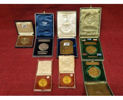 Quantity of cased military sporting awards including medals from the 1960 CISM Brussels Military World Championships.  Awards