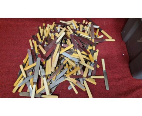 Large collection of vintage dinner knives.