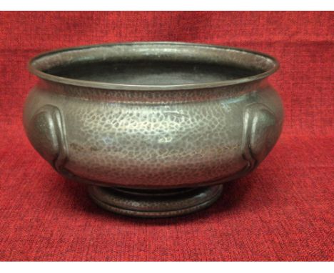 Liberty & Co, Archibald Knox hammered pewter bowl with pedestal base and Celtic motifs, overall diameter 10" with later walnu