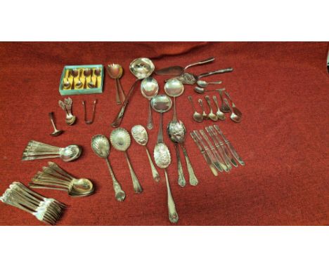 Assorted EPNS cutlery to include dessert servers, table cutlery, large ladle, cake servers, etc.