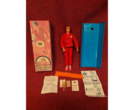 Vintage Six Million Dollar Man doll with original box and box fittings complete with girder.