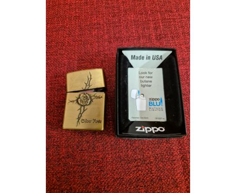 Kantai Zippo Silver Rose lighter.