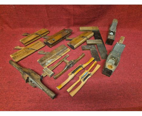 Vintage woodworking tools including block and moulding planes, spoke shaves and squares.