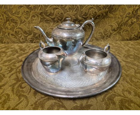 EPNS 3 piece teaset and tray with engine turned decoration.