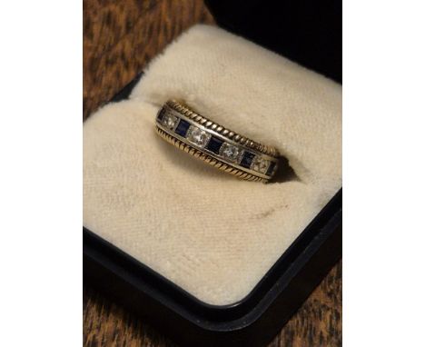9ct gold and gemstone eternity ring 4.76g, size L.