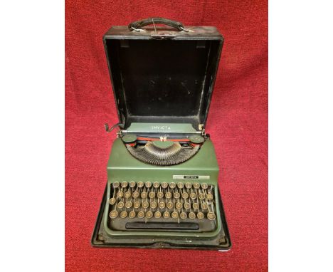 Rare Invicta 1930's portable typewriter in green paint finish with hard carry case, Serial No. 131010