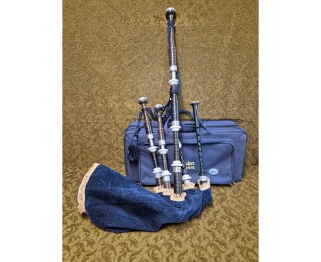 Set of McCallum bagpipes and bag.