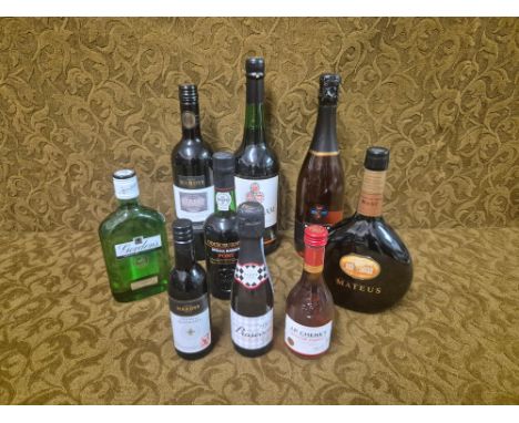 Mixed wines and spirits to include Hardys wine, Gordons gin, Mateus Rose, etc.