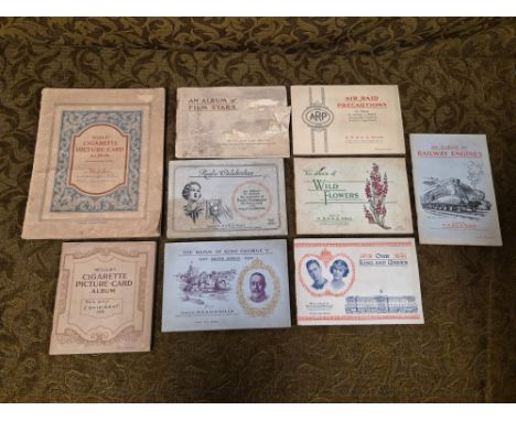 Wills cigarette card albums, complete sets.  Railway Engines, Air Raid Precautions, Wild Flowers, Film Stars, Radio Celebriti