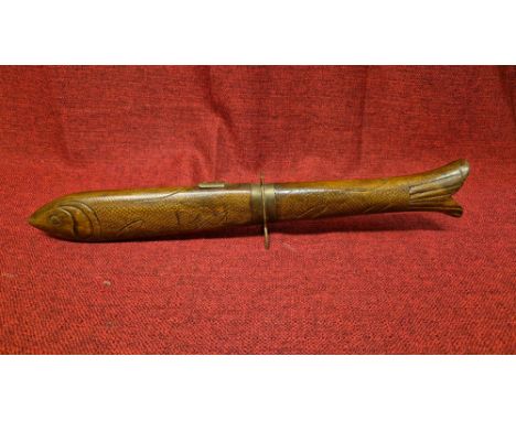 Novelty Indian large knife and fork in carved fish case, 44" long.