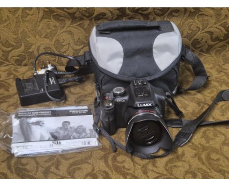 Panasonic Lumix FZ150 digital camera, 24x optical zoom complete with instructions, carry bag and charger.