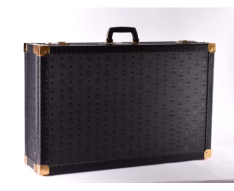Vintage Reisekoffer MCM 1980er JahreMonogramm in schwarz, Messingbeschläge vergoldet, teils etwas angelaufen, innen orangefar