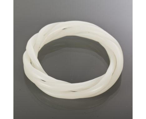 CHINESE JADE BANGLE
of four intertwined sections, in white/pale jade 