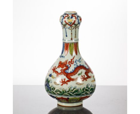 CHINESE CERAMIC VASE
decorated with dragons chasing the flaming pearl, mark to body of vase, 27cm high 