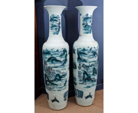 VERY LARGE PAIR OF 20TH CENTURY CHINESE FLOOR VASES
with trumpet necks and baluster bodies, showing architectural landscape d