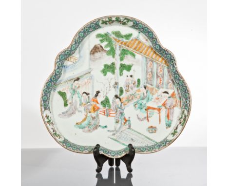 CHINESE FAMILLE VERTE DISH
decorated with figures in an architectural landscape setting, 28cm wide, 27cm high