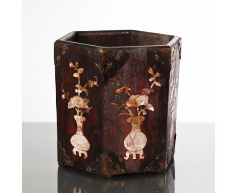 CHINESE WOODEN AND MOTHER OF PEARL BRUSH POT 
of hexagonal form and with flowers in vases inlay and with metal mounts to the 