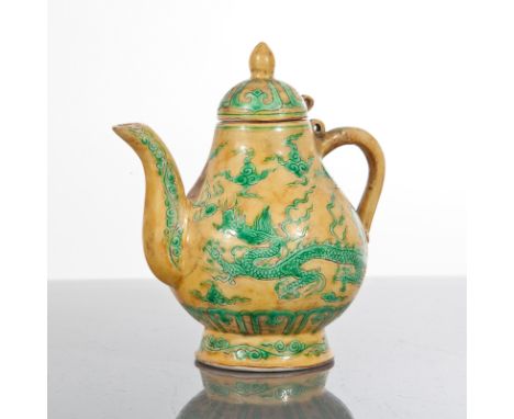 CHINESE CERAMIC TEAPOT
decorated with dragons in green on a yellow ground, six character mark to base, 13cm high 