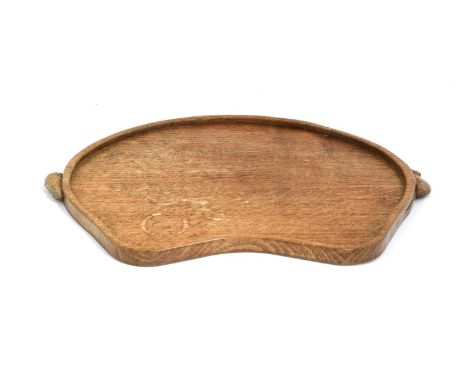 Workshop of Robert Mouseman Thompson (Kilburn): An English Oak Kidney Tea Tray, with carved mouse trademark handles, 48cm wid