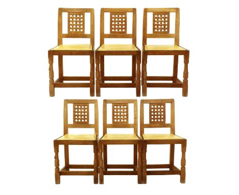 Workshop of Robert Mouseman Thompson (Kilburn): A Set of Six English Oak Lattice Back Dining Chairs, 1970s, cow hide seats, o