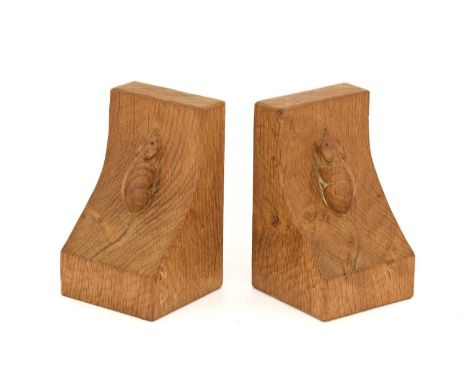 Workshop of Robert Mouseman Thompson (Kilburn): A Pair of English Oak Single Mouse Bookends, each with carved mouse trademark