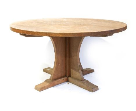 Workshop of Robert Mouseman Thompson (Kilburn): An English Oak 4' 6" Round Dining Table, the adzed top on a cruciform base, w