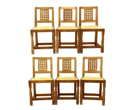 Workshop of Robert Mouseman Thompson (Kilburn): A Set of Six English Oak Lattice Back Dining Chairs, 1970s, cow hide seats, o