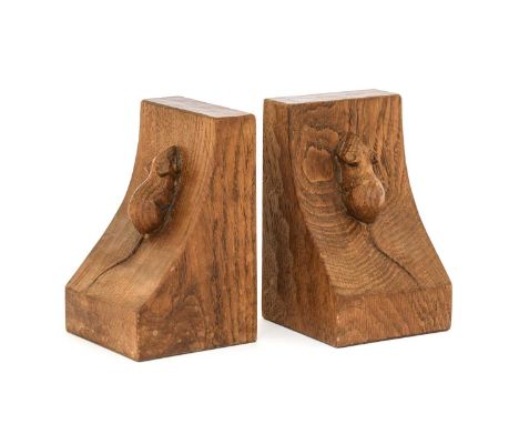 Workshop of Robert Mouseman Thompson (Kilburn): A Pair of English Oak Single Mouse Bookends, each with carved mouse trademark