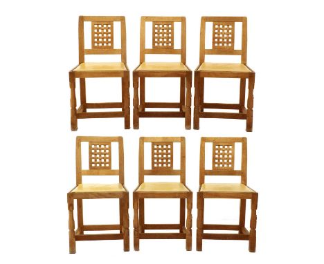 Workshop of Robert Mouseman Thompson (Kilburn): A Set of Six English Oak Lattice Back Dining Chairs, 1970s, cow hide seats, o