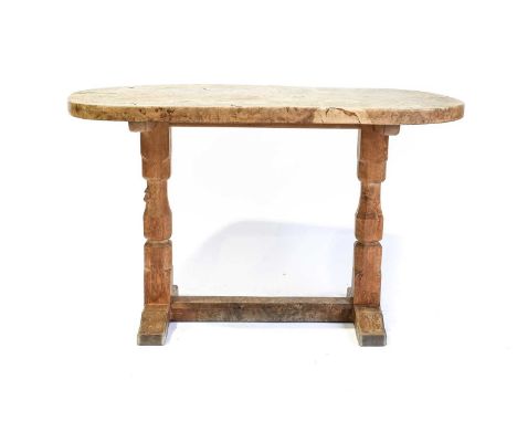 Workshop of Robert Mouseman Thompson (Kilburn): A Burr Oak Oval Table, on two octagonal legs joined by a floor stretcher, wit