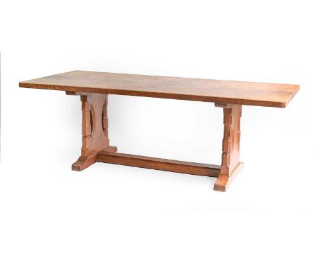 Robert Mouseman Thompson (1876-1955): An English Oak 7ft Refectory Table, dowelled adzed four plank top, on two double octago