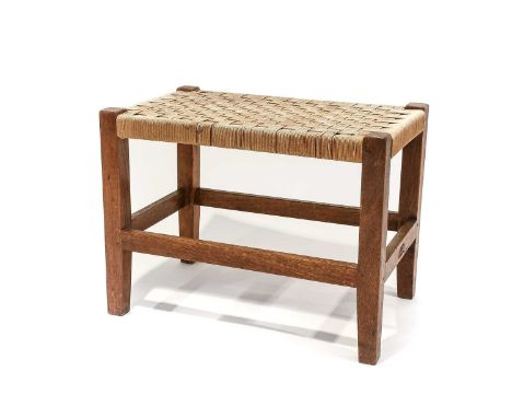 Workshop of Robert Mouseman Thompson (Kilburn): An English Oak Stool, with woven cord seat, on four square section legs joine