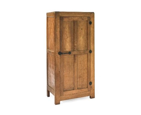 Robert Mouseman Thompson (1876-1955): An English Oak Single Door Wardrobe, circa 1930s, wrought iron hinges and latch with he